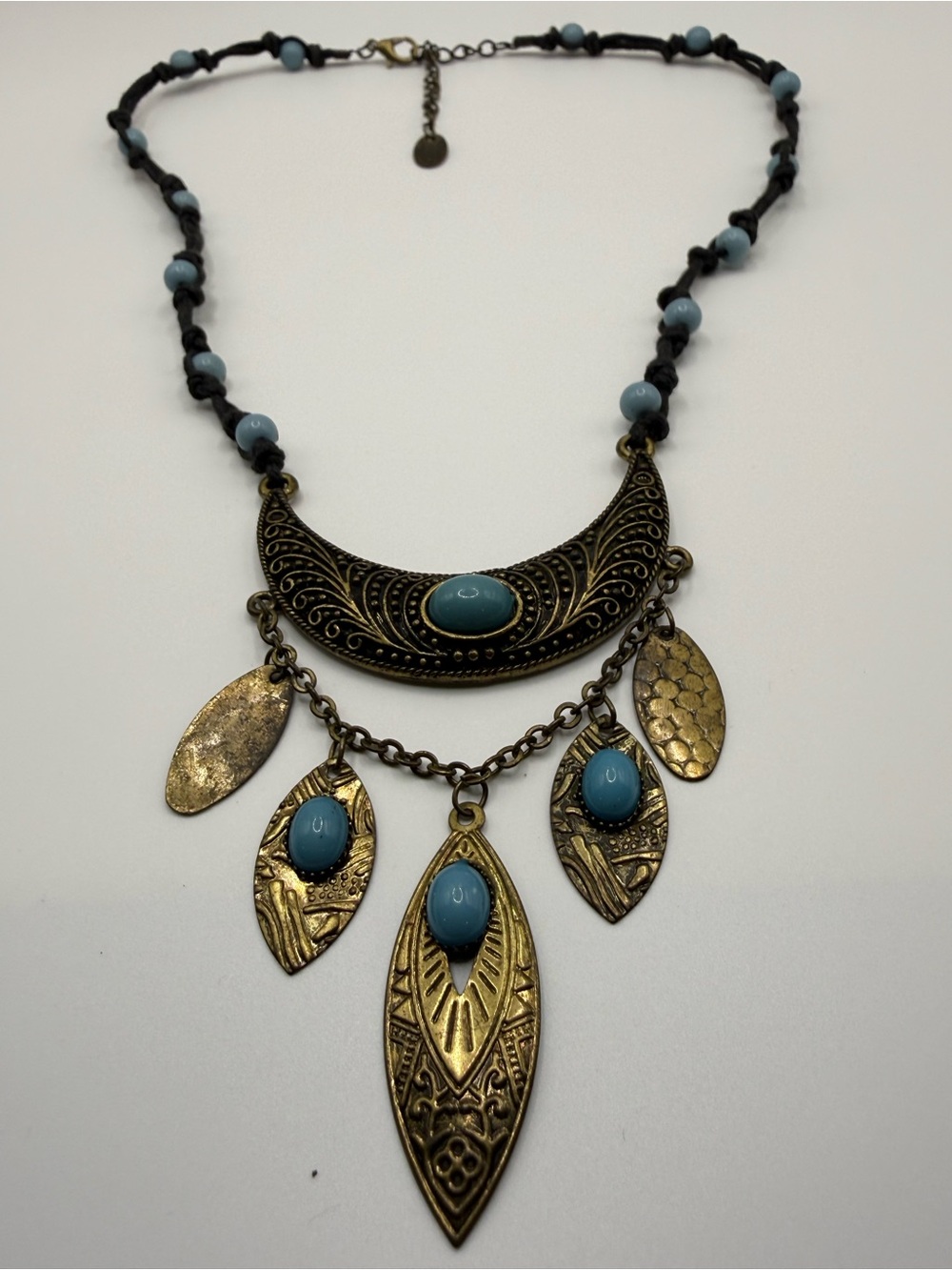 Bohemian/Mediterranean/Tribal
Dangle Necklace Halloween
Vintage-inspired Design